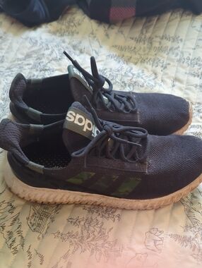 adidas Men's Black Athletic Shoes with Green Accent Stripes